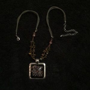 Purple necklace with big stone